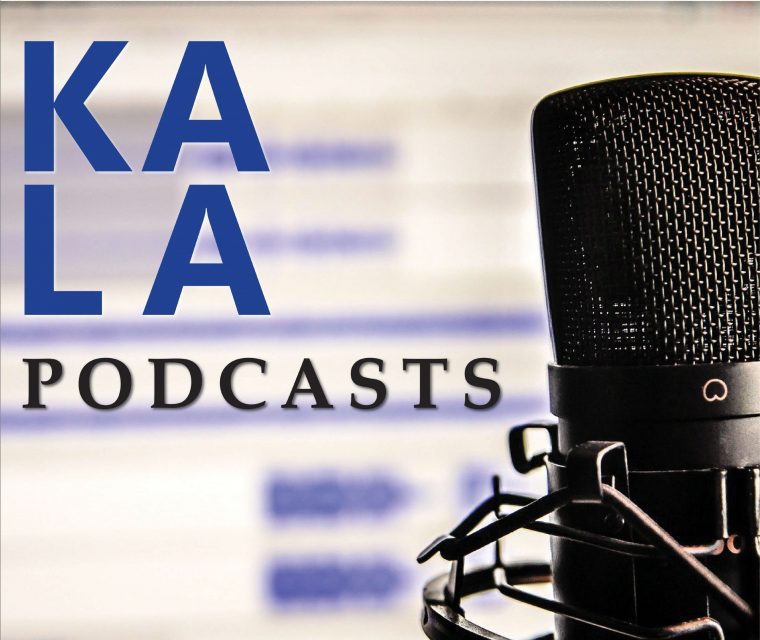 KALA Podcasts with microphone.