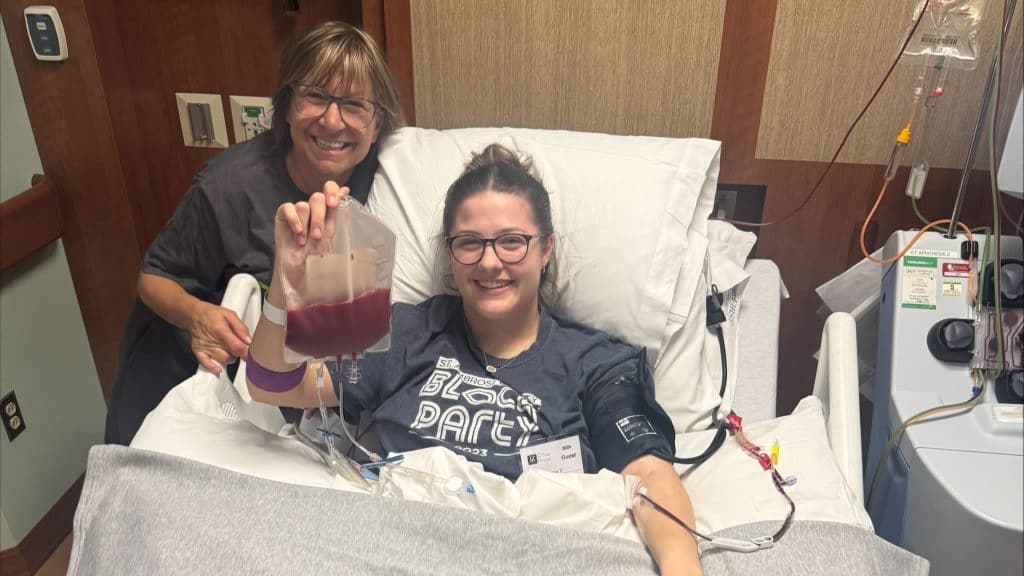 Female student donating blood